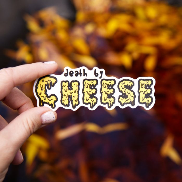 Death by Cheese written in melting font the color of cheddar cheese